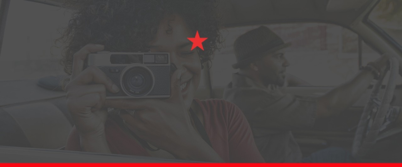 Texaco's red star logo with a transparent background, featuring a man and woman driving